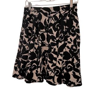 Adrienne Vittadini mini skater skirt size small. Black and white floral pattern.